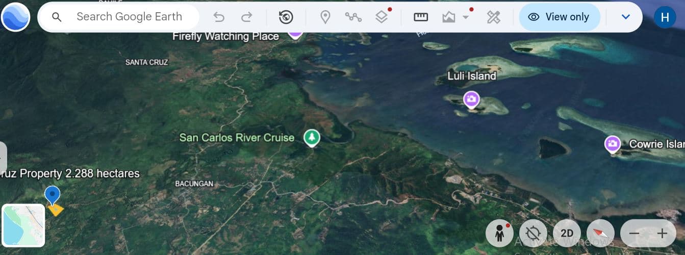 2.2-HECTARE RAWLAND FOR SALE ALONG NATIONAL HIGHWAY . BACUNGAN, PUERTO PRINCESA